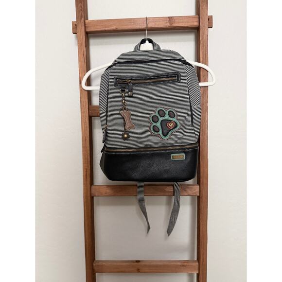 Chala Deluxe Striped Backpack with a black paw print. - Picture 2 of 6